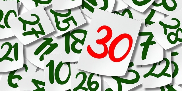 A pile of notes containing numbers reflecting possible court deadlines, topped by a 30 day deadline